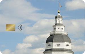 The new Maryland EBT card featuring an embedded chip and a background photo of the state capitol building in Annapolis.